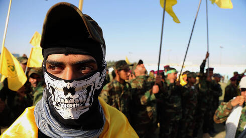 מחבלים של ארגון כתאיב סייד א-שוהדא, אחת המיליציות השיעיות, צילום: AP