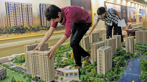 במימון ממשלת סין: ערים ימירו דירות ריקות לדיור בר־השגה