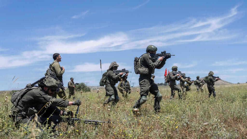 חיילי מילואים בגולן, ארכיון (צילום: AP Photo/Ohad Zwigenberg) חיילים חיילי מילואים בגולן