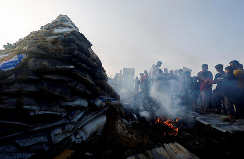 אזור התקיפה ברפיח, צילום: REUTERS/Mohammed Salem