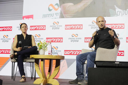 Naftali Bennett (right) and Michal Tsur. 