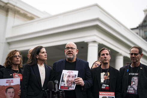 Jonathan Dekel-Chen (center) with other family members of U.S. hostages in Washington D.C. 