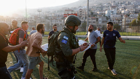 פינוי מהמגרש, צילום: Jalaa MAREY / AFP