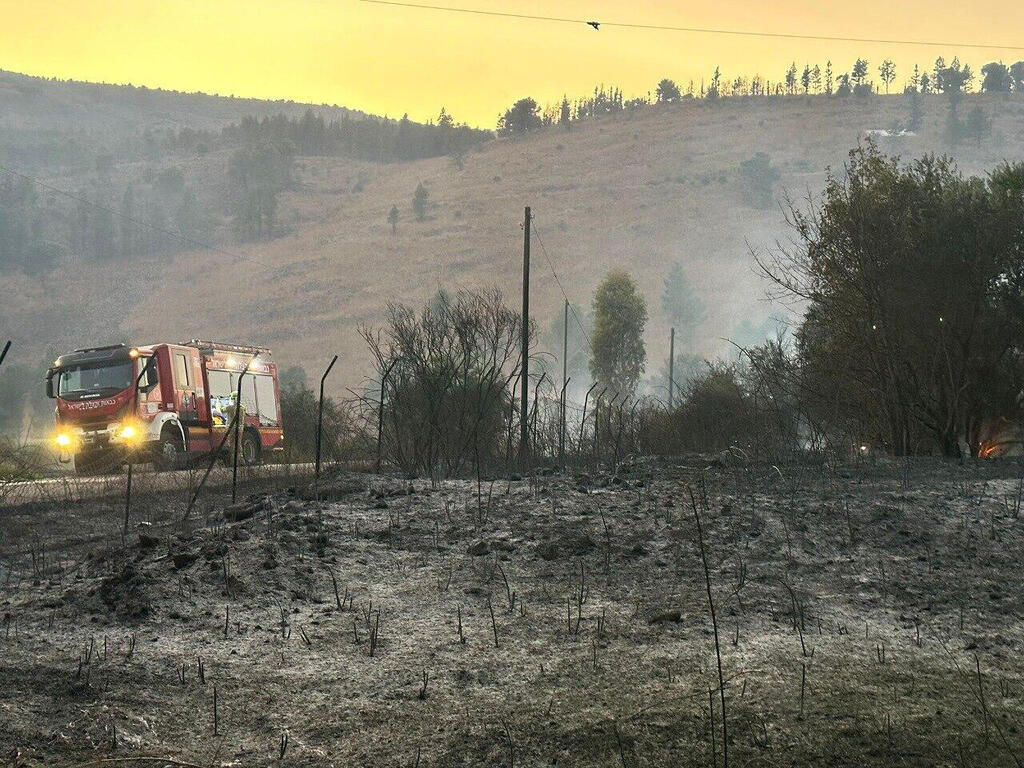 קריית שמונה שריפה דליקה מרחב הגליל תוצאה בעקבות מטח רקטות מ לבנון גבול צפון