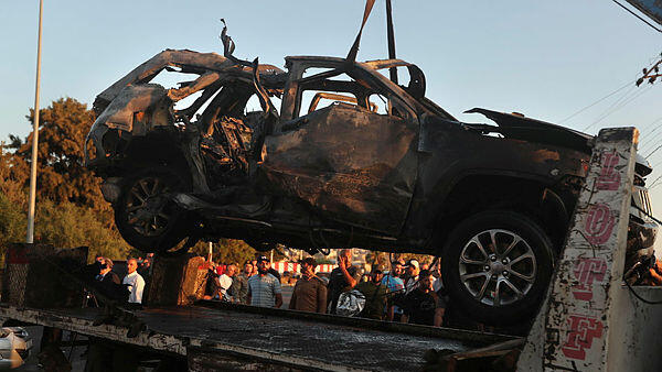 שרידי המכונית , צילום: AP Photo/Mohammed Zaatari