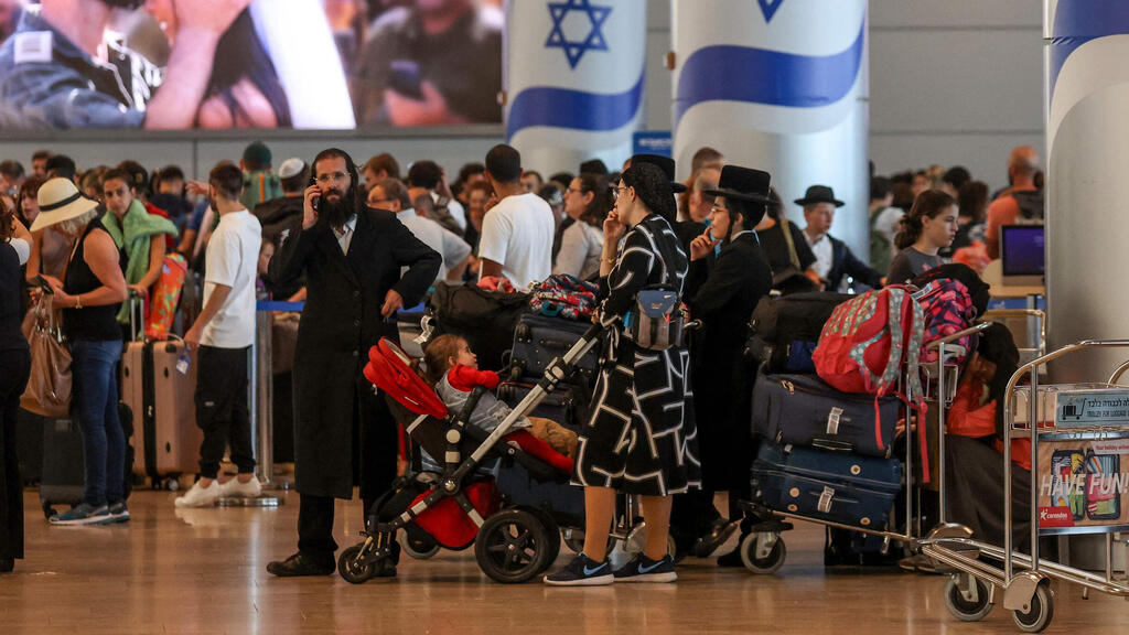 עומס בנתב"ג (צילום: אי.אף.פי) עומס בנתב"ג בשבוע שעבר. "אנשים נתקעו בחו"ל כי החברות הזרות הלכו מפה. זאת אינדיקציה לחשיבות התמיכה בחברות ישראליות"