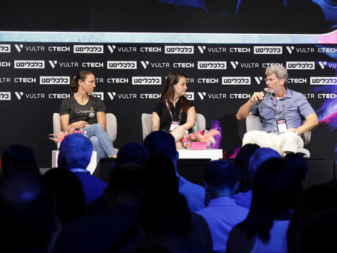 Panelists Amir Di-Nur of eBay Israel, Aviv Ben Arie from Intuit, and Yael Peled Adam of Laguna. 