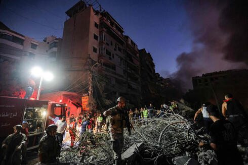 ההרס במתחם שהופצץ בדאחייה, צילום: Ibrahim AMRO / AFP