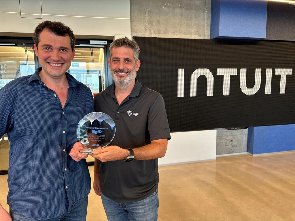 BigID’s Nimrod Vax (right), receiving the award from Gleb Keselman, Intuit’s Director of security software engineering 