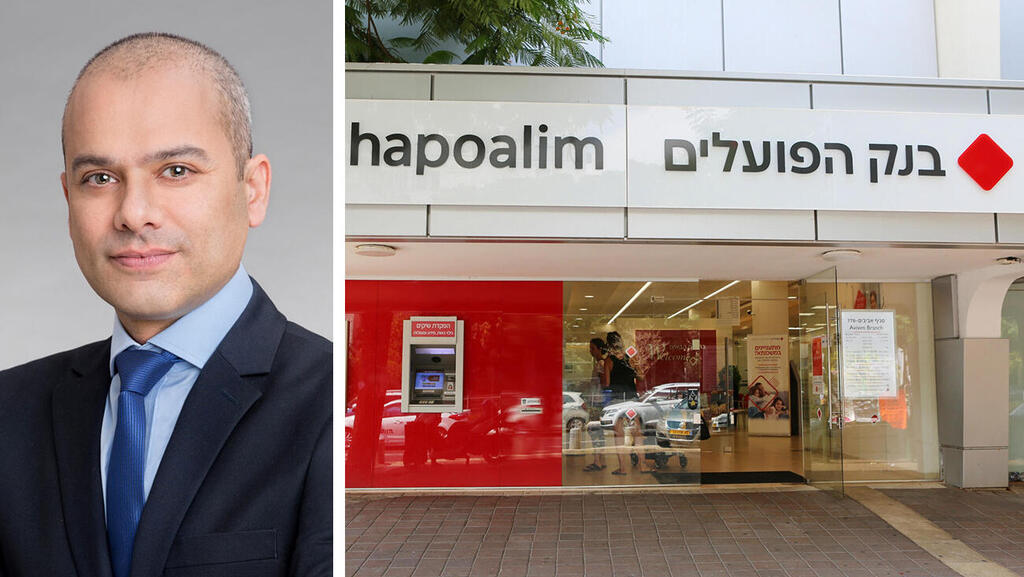 ידין ענתבי מנכ"ל בנק הפועלים לצד סניף הבנק