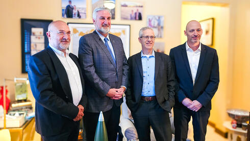 Indiana governor Eric Holcomb<span style="font-weight: normal;"> (second from left) with </span>Doral Leadership 