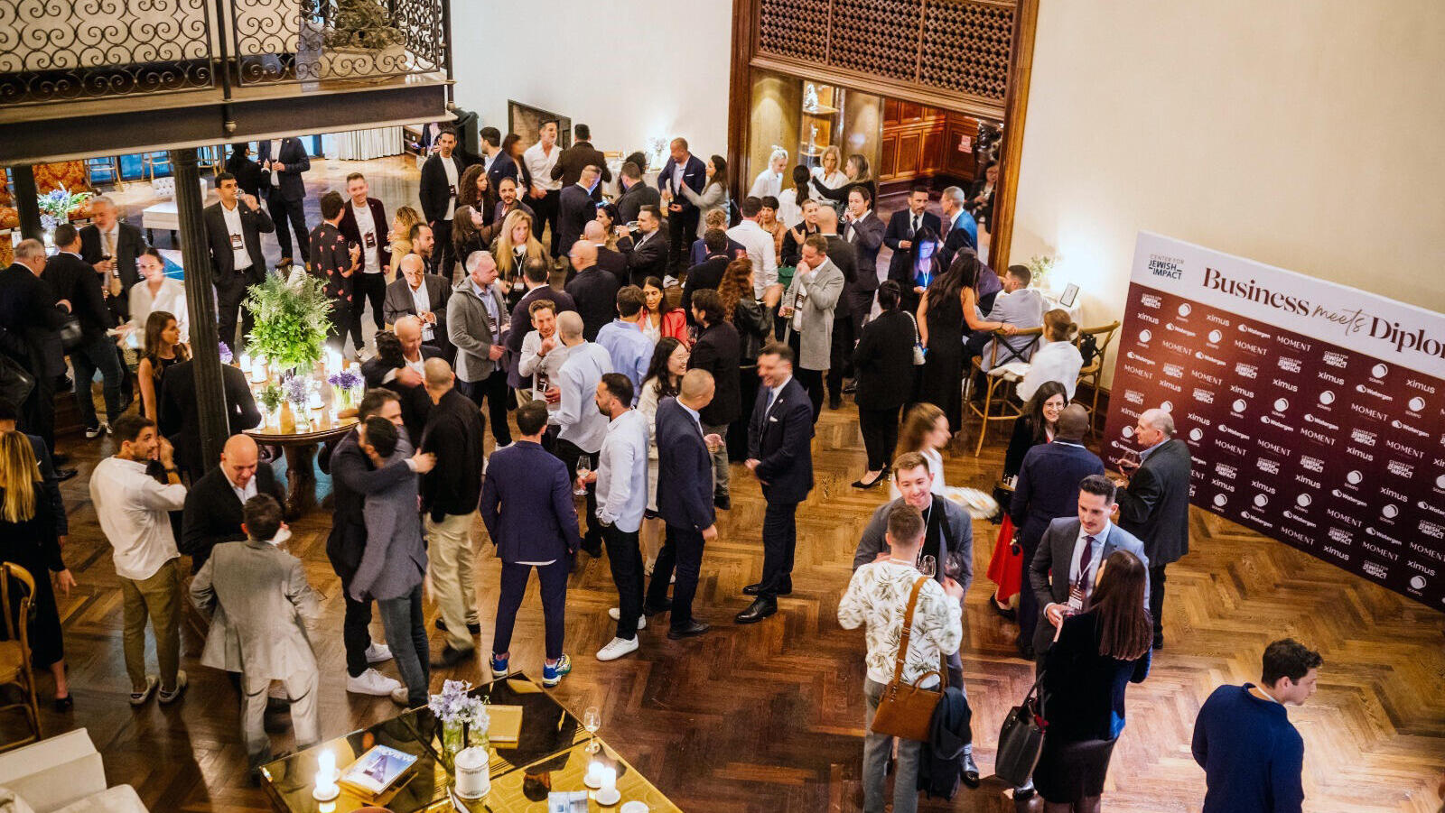 מינגלינג אירוע של המרכז לאימפקט יהודי ו פורום אקסימוס