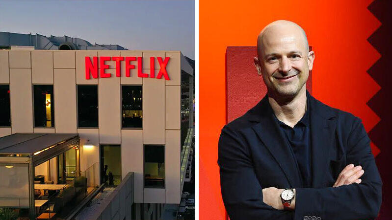 סגן נשיא ב נטפליקס לארי טאנז לצד משרדי נטפליקס בהוליווד לוס אנג'לס