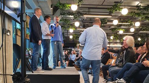 Amazon CEO Andy Jassy and AWS CEO Matt Garman on stage during their visit to the company’s R&amp;D center in Israel.