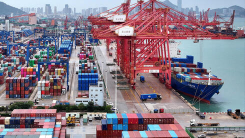 צילום: China Daily via REUTERS העודף המסחרי של סין חצה לראשונה את רף הטריליון דולר