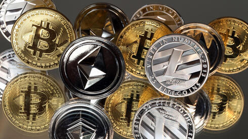 Cryptocurrencies. (Photo: Chris Ratcliffe/Bloomberg) מטבעות קריפטו 17.10.17