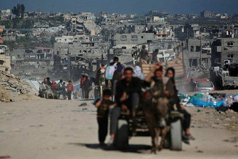 רצועת עזה, הבוקר (צילום: Bashar TALEB / AFP) תושבים ב רצועת עזה עוזבים לאחר חידוש ההתקפות של צה"ל מלחמה בעזה 18.3.25