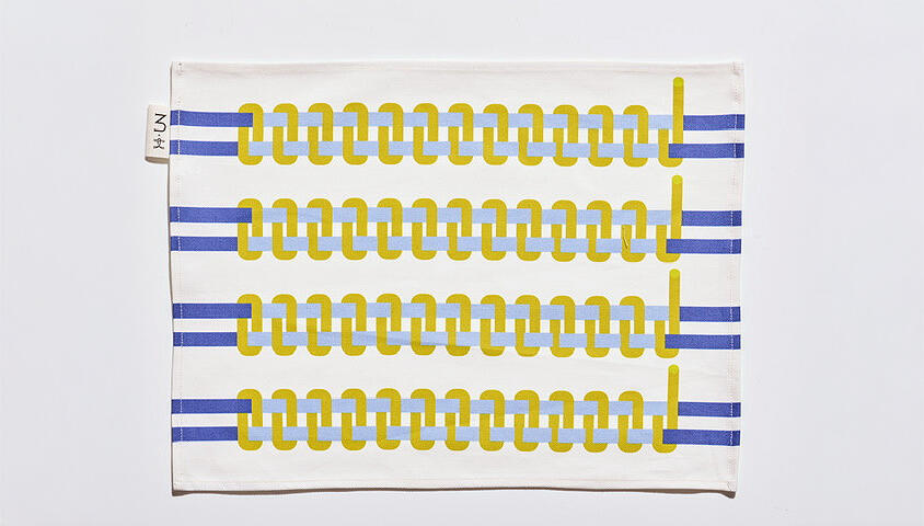 פלייסמטים לשולחן של מותג NU של נורית קריב בשיתוף עם נטע טסלר מסטודיו Knots פנאי