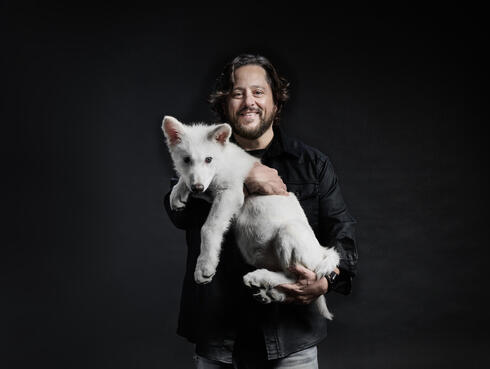 Sam Lamm holding Romulus Sam Lamm holding Romulus