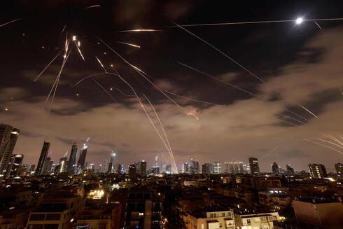 Missile interceptions above Tel Aviv. 