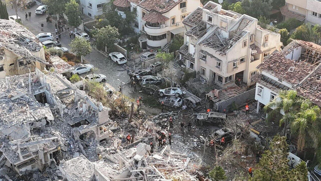 Scene of a missile strike in Rishon LeZion. (Rishon LeZion Municipality spokesperson and the drone unit of the Public Security and Order Company)