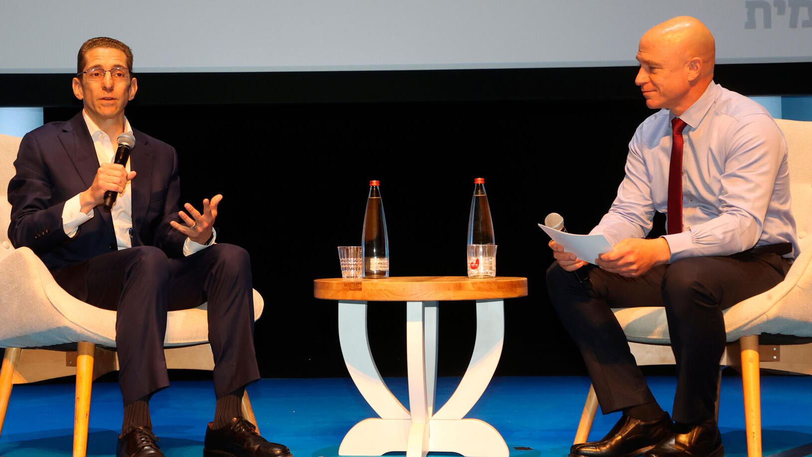 כנס כלכלית לאומית - יורם נוה מנכ"ל כלל ביטוח ופיננסים בשיחה עם  Kenneth Caplan Global Co-Chief Investment Officer Blackstone