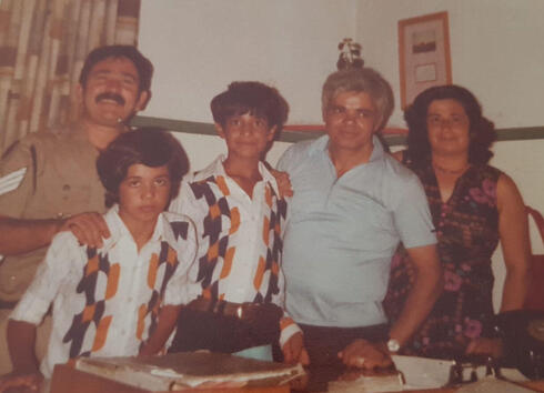 Young Alon Cohen with his family 