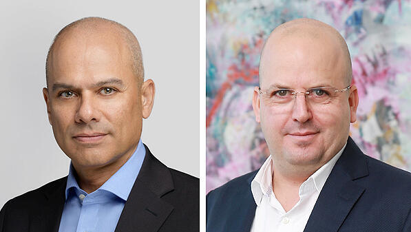 מימין מנכ"ל אנרג'יקס אסא לוינגר ומנכ"ל בנק הפועלים ידין ענתבי