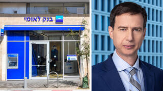 מנכ"ל בנק לאומי חנן פרידמן לצד סניף בנק לאומי