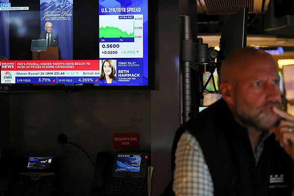 צילום: גטי אימג'ס מסחר ב וול סטריט על רקע נאום פאוול