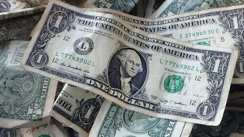 צילום: AP /Mark Lenniha שוק המטבעות בעמדת המתנה: הדולר מתחת ל-3.12 שקלים