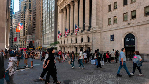 צילום: SPENCER PLATT / GETTY IMAGES עמדת המתנה: תנועות קלות בוול סטריט