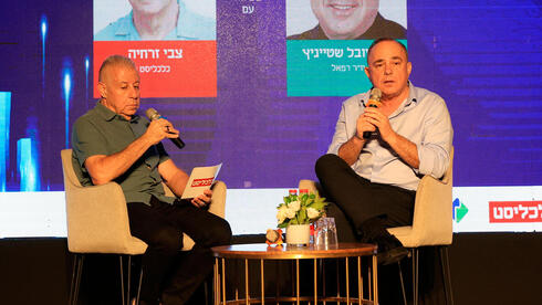 Rafael Chairman Yuval Steinitz (right) interviewed at Haifa Conference Rafael Chairman Yuval Steinitz (right) interviewed at Haifa Conference
