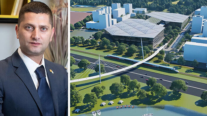 רועי לוי ראש עיריית נשר וסגן יושב ראש מרכז שלטון מקומי לצד הדמיית פרויקט קמפוס אנבידיה בנשר