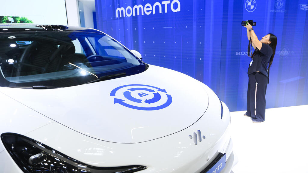 דוכן של מומנטה Momenta הסינית 2 בתערוכת הרכב במינכן ספטמבר 2025