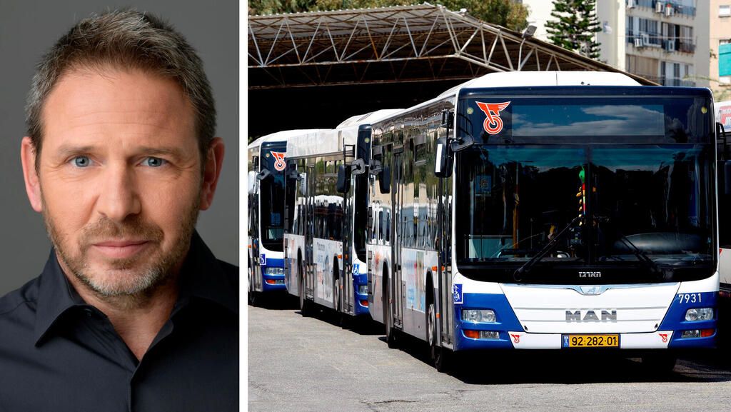 אופיר קרני מנכ"ל דן לצד אוטובוסים של חברת דן