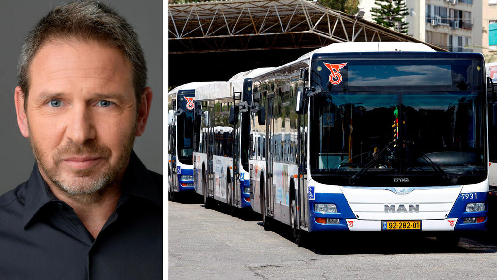 אופיר קרני מנכ"ל דן לצד אוטובוסים של חברת דן