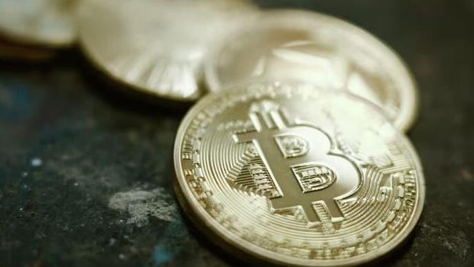 נסיגה חזקה במטבעות (Pat Batard/Hans Lucas/AFP) מטבע ביטקוין קריפטו