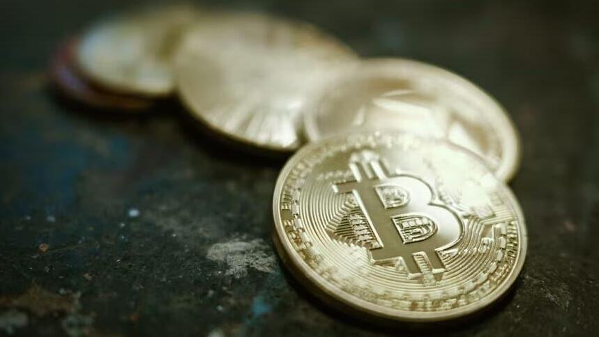Bitcoin crypto currency (Pat Batard/Hans Lucas/AFP) מטבע ביטקוין קריפטו