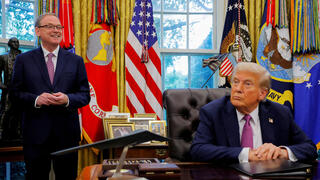 הנשיא דונלד טראמפ ויו"ר מועצת הכלכלה קווין האסט