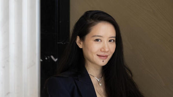 יי הי (צילום: בלומברג) יי הי בייננס ביינאנס