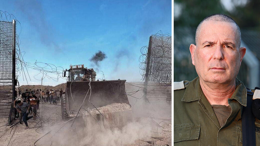 אלוף ערן אופיר לצד טרקטור פורץ את מכשול עזה עם פרוץ מלחמת חרבות ברזל (צילום: דנה קופל) ערן אופיר אלוף ראש מנהלת גבולות ותפר לצד טרקטור פורץ את ה מכשול ה גדר ב גבול עזה ישראל פרוץ מלחמת חרבות ברזל