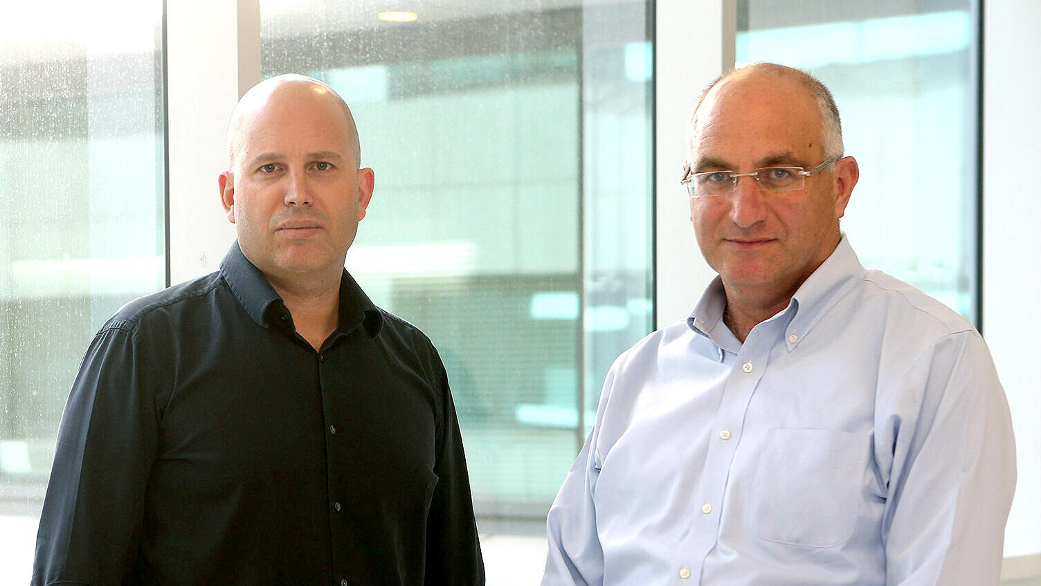 מימין גל עמית ו רפי ליפא יועצי השקעות