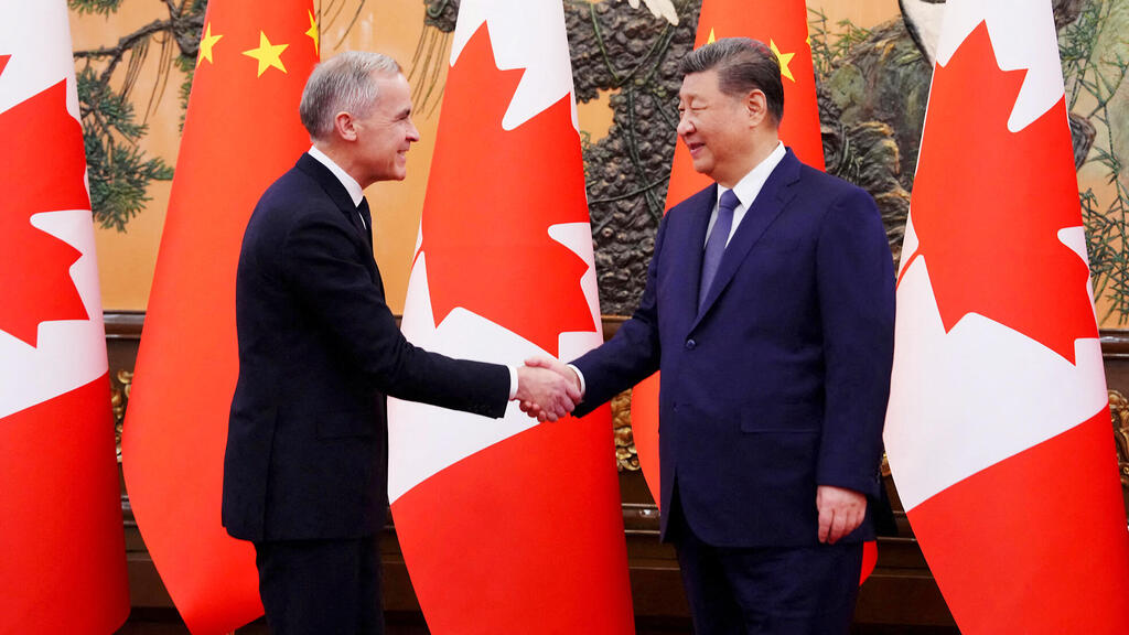 נשיא סין שי ג'ינפינג וראש ממשלת קנדה מארק קרני