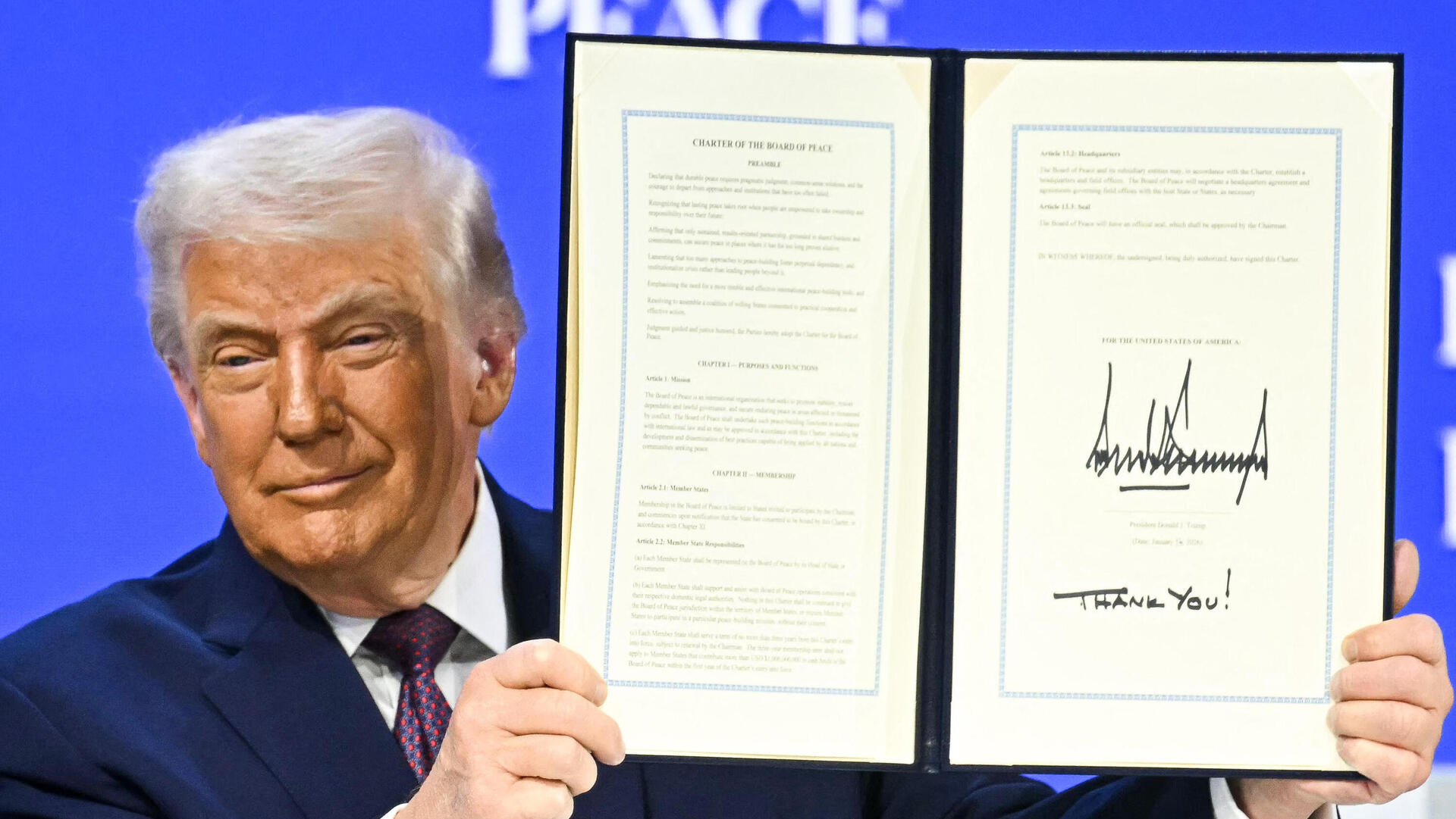 נשיא ארה"ב דונלד טראמפ מציג את מועצת השלום ב פורום הכלכלי העולמי ב דאבוס 22.1.26