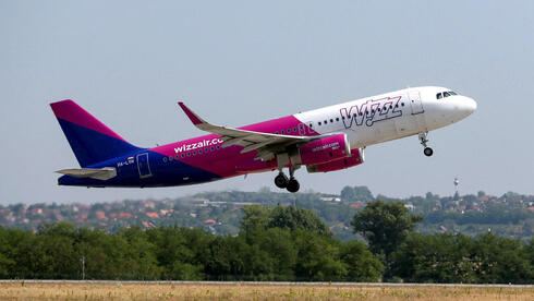 צילום: REUTERS/Bernadett Szabo שיבושים ועיכובים: בענף התעופה המקומי נערכים למאבק נגד הקמת המרכז התפעולי של וויז אייר