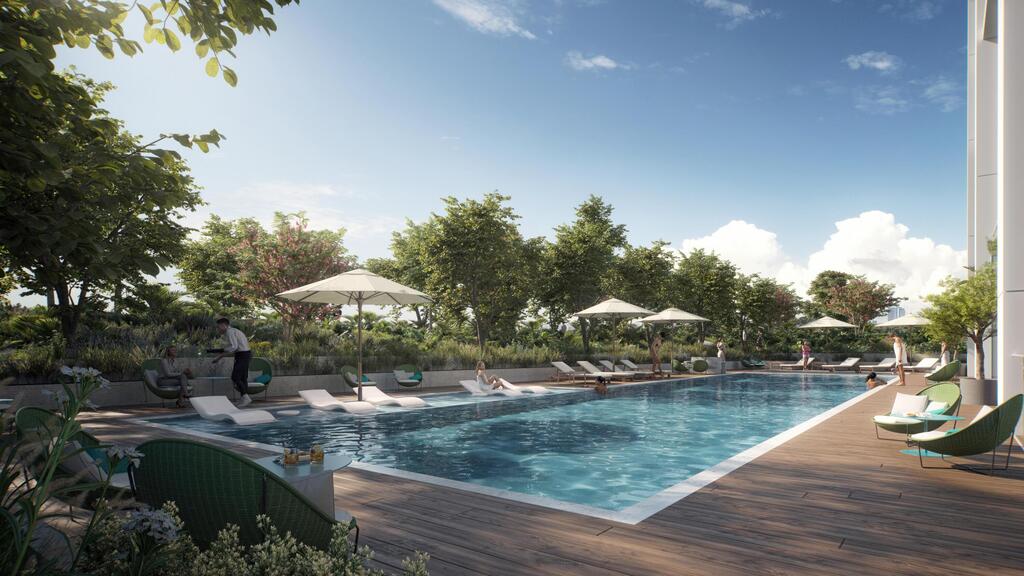  בריכת שחייה ובריכה לילדים הכוללת מיטות שיזוף, פינות ישיבה מוצלות וריהוט גן