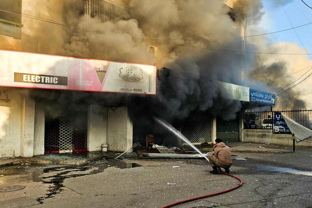 תקיפות בדאחייה (צילום: AFP) תקיפות דאחייה ביירות לבנון שאגת הארי