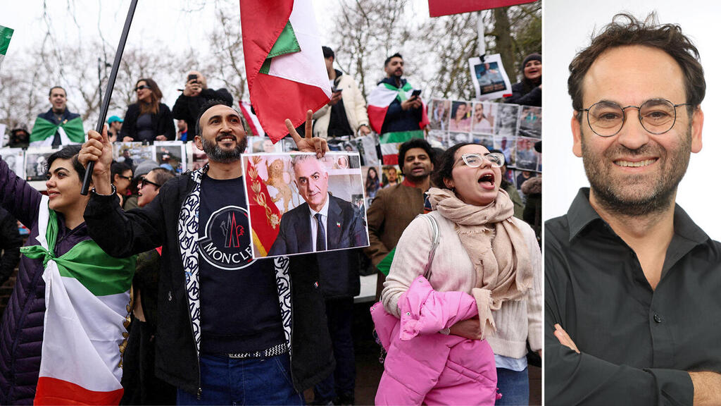 ד''ר אלי קוק, לצד עצרת בלונדון לתמיכה ברזא פהלווי בנו של השאה האחרון של איראן (צילומים: REUTERS/Jack Taylor , דוברות אוניברסיטת חיפה) ד''ר אלי קוק ו עצרת תמיכה ברזא פהלווי בנו של השאה האחרון של איראן בלונדון 1.3.26