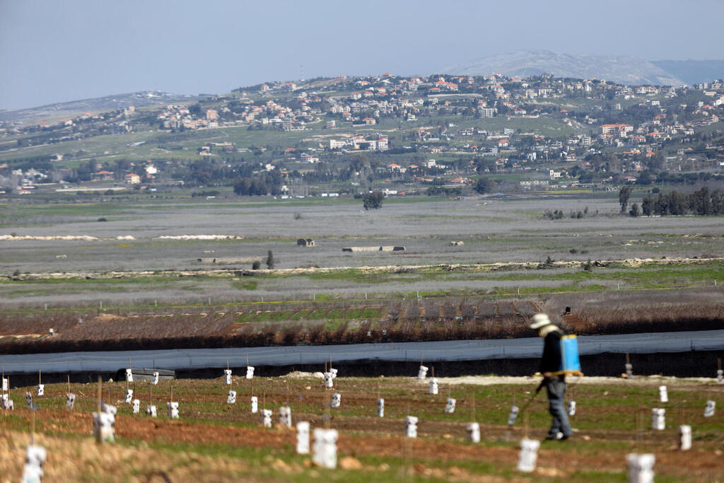 חקלאי במטולה (צילום: Amir Levy/Getty Images) חקלאי במטולה